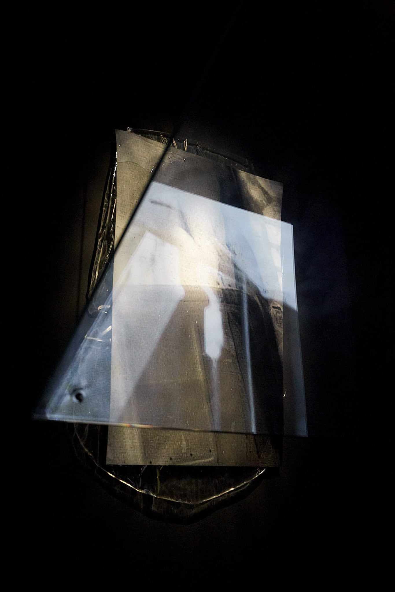 <p><i>Sequence</i>, 2020. glass panel, LCD screen, giclee photographic prints set In epoxy resin, metal rope, varying sizes Installation View, SIT Gallery, 2020</p>